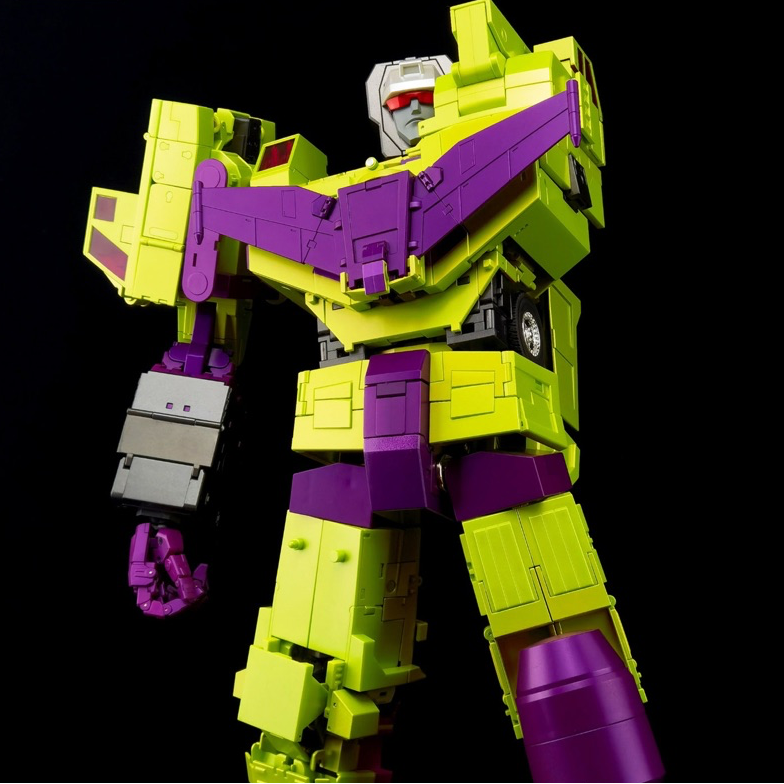 A toy robot figure in lime green and purple armor, posed against a black background with a logo and the name 'HADD' visible at the top.