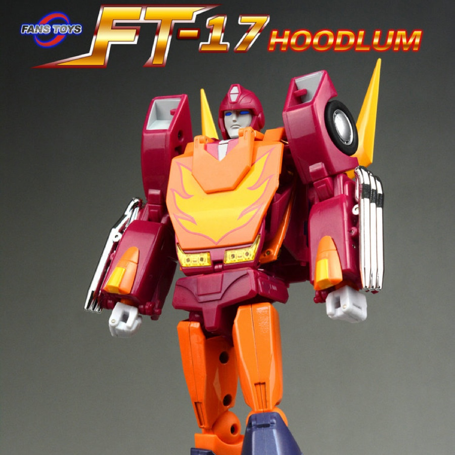 Transformers FT-17 Hoodlum action figure standing on a gray rocky base against a dark gray gradient background, with the Transformers logo and FT-17 HOODLUM text at the top.