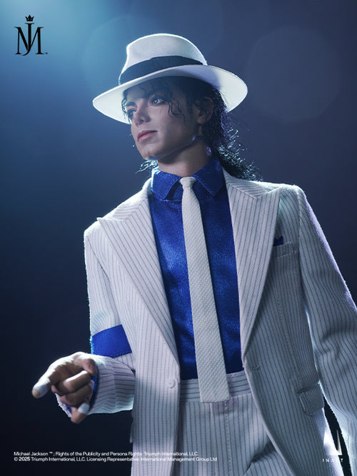 Michael Jackson in a white pinstripe suit, white fedora hat, and blue shirt, posed against a dark blue background with a spotlight effect. A stylized 'M' logo is visible in the top left corner.