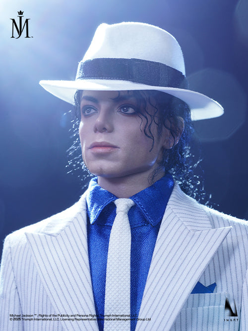 Michael Jackson collectible figure or statue in a white pinstripe suit, white fedora with a dark band, and a bright blue shirt and tie, shown against a blue-lit background.