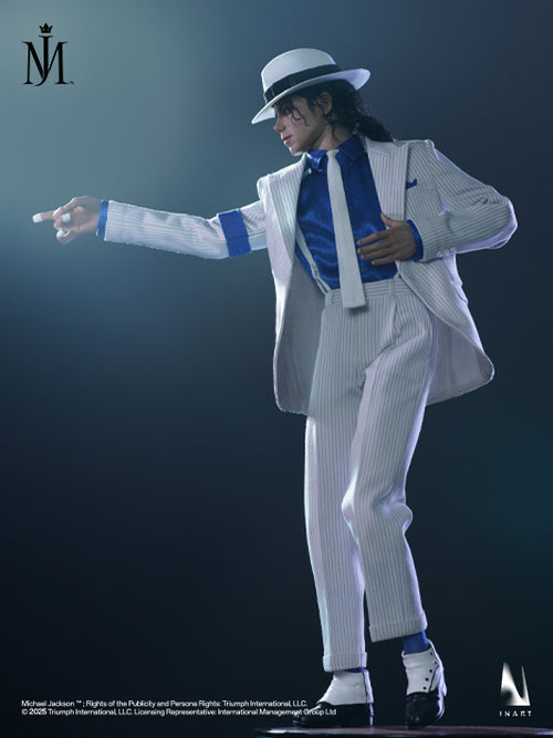 Michael Jackson in a white pinstripe suit with a blue shirt, white hat, and white shoes, posed dynamically against a dark studio background. The image includes Triumph International branding and copyright text.