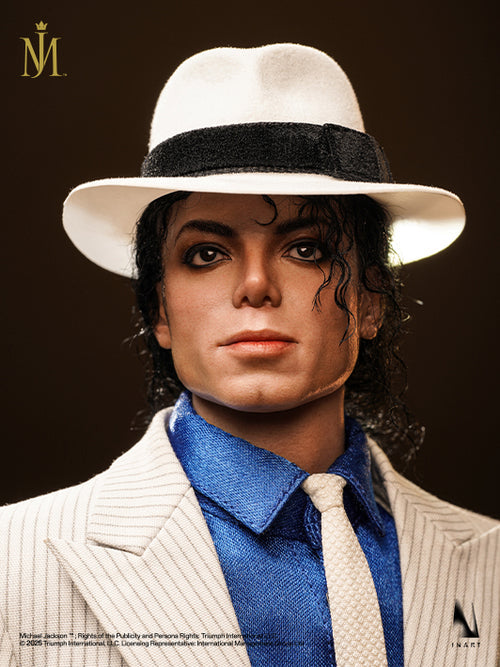 Person wearing a white hat and formal outfit with a dark background